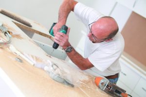 Carpenter working on some furniture